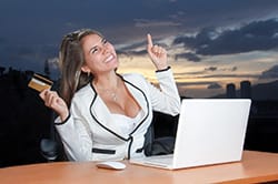 happy woman with laptop